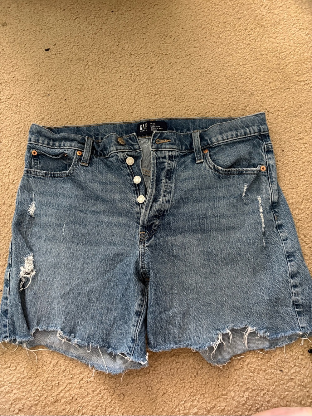 GAP Raw Hem Distressed Denim Shorts in Medium Blue